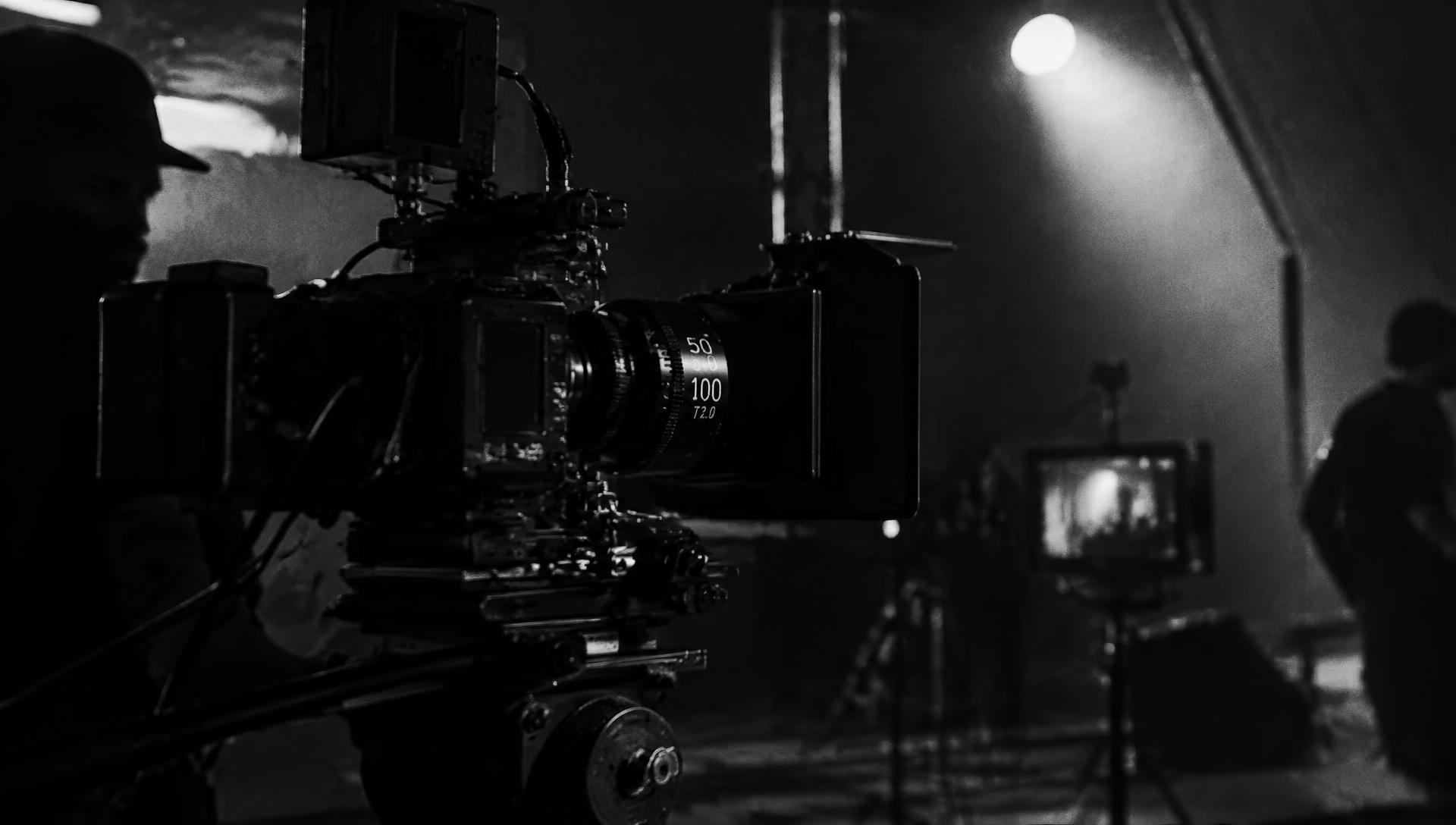 Cinema camera on set in a dark production studio